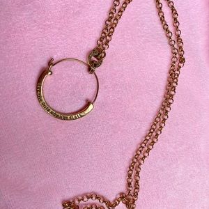 Juicy Couture charm holding necklace